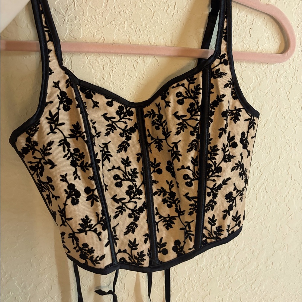 Nude and black floral corset top